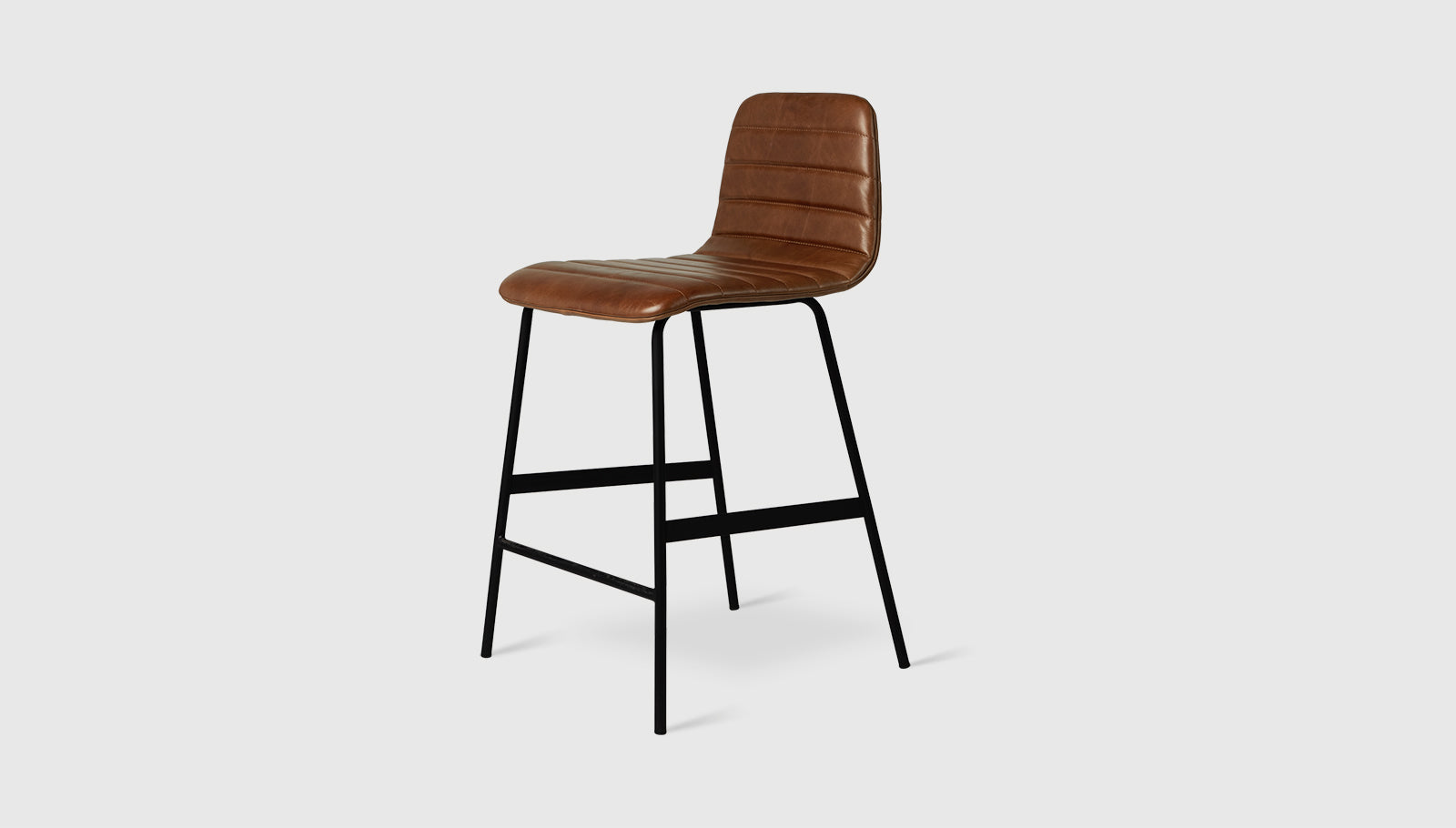 Lecture Counter Stool Upholstered Saddle Brown Leather / BlackChair Gus*  Saddle Brown Leather Black  Four Hands, Mid Century Modern Furniture, Old Bones Furniture Company, Old Bones Co, Modern Mid Century, Designer Furniture, https://www.oldbonesco.com/