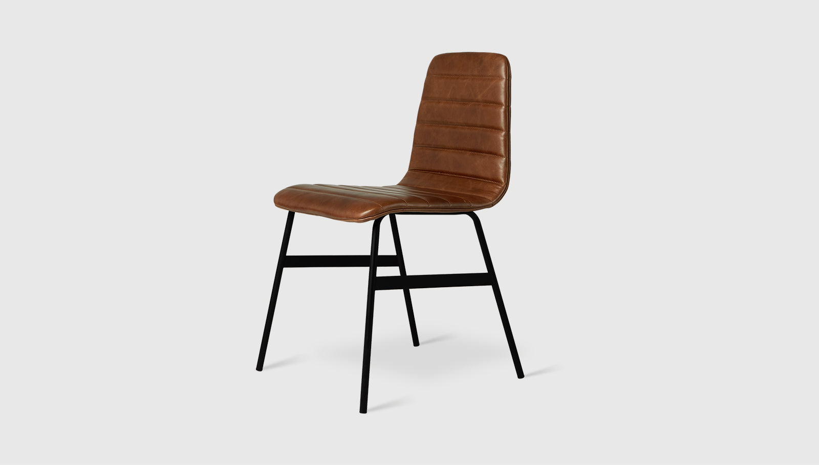 Lecture Dining Chair Upholstered Saddle Brown Leather / BlackDining Chair Gus*  Saddle Brown Leather Black  Four Hands, Mid Century Modern Furniture, Old Bones Furniture Company, Old Bones Co, Modern Mid Century, Designer Furniture, https://www.oldbonesco.com/